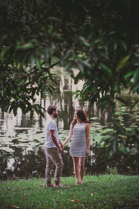 The lake at The Abbey is beautiful and trees line the bank. A perfect spot for a photo of the engaged couple
